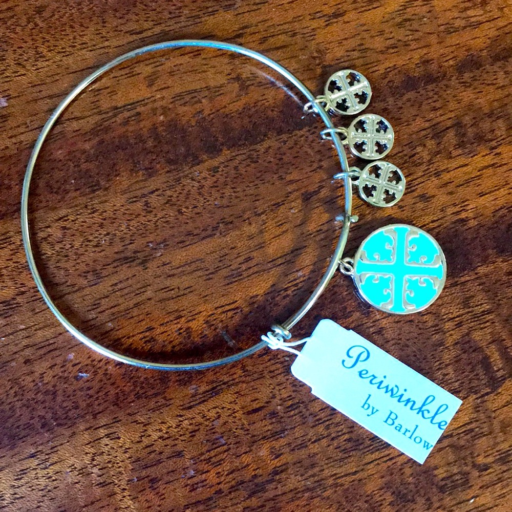 Periwinkle by Barlow, charm bracelet with Tory Burch charms.